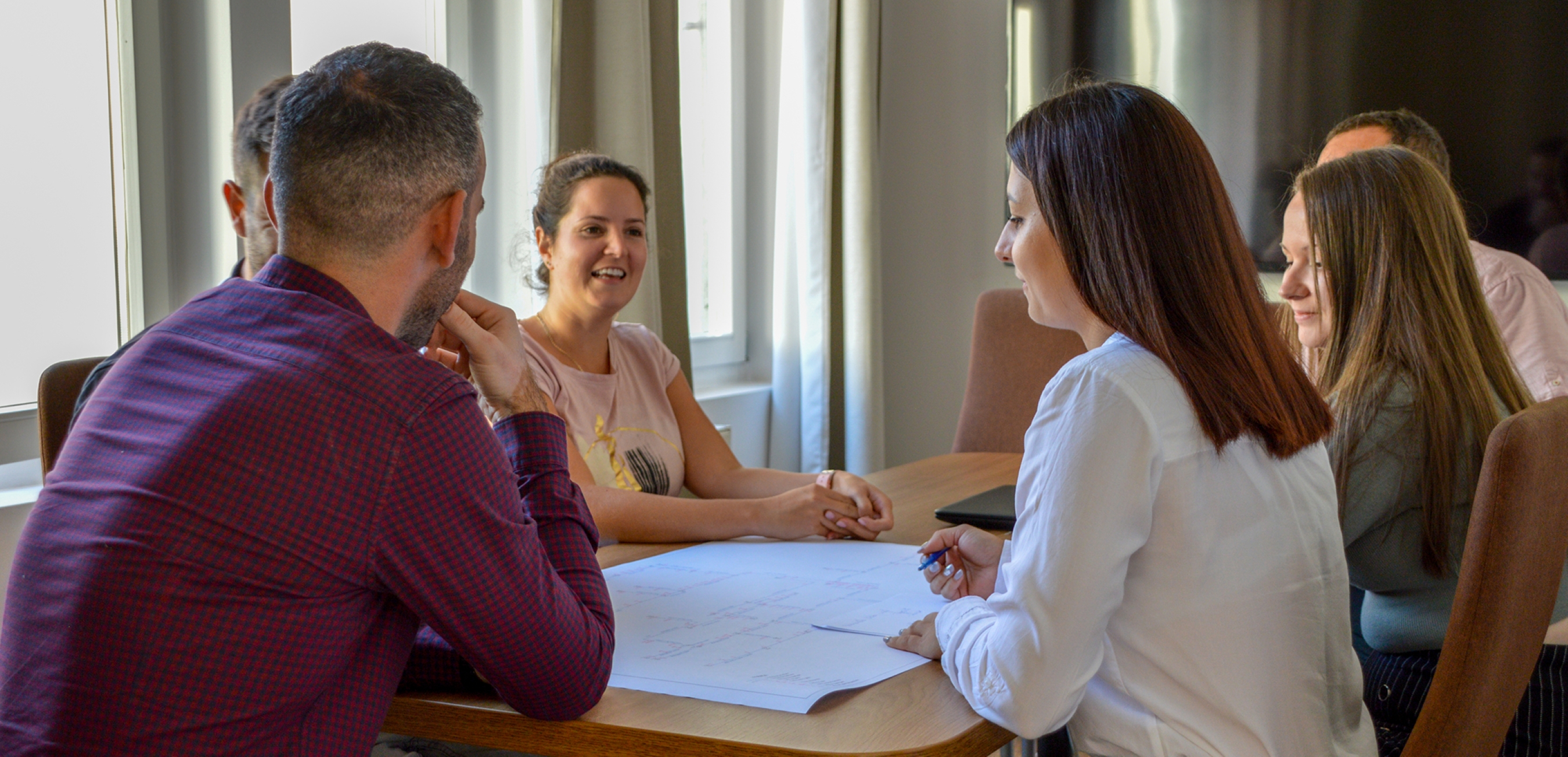 alt.about-us.team-photo-hover